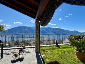 a view of theosphorus from a house overlooking the water at Charmantes Rustico La Vedetta mit Terrasse in Minusio +10 photos