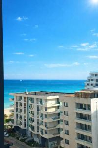 a view of the ocean from a building at Building Stefan Resort 2 Mamaia Nord - Studio 804 in Năvodari