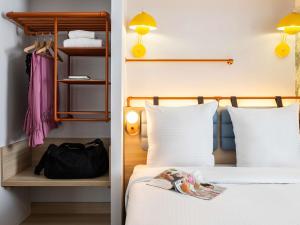 Postel nebo postele na pokoji v ubytování Ibis Styles Brussels Centre Rogier