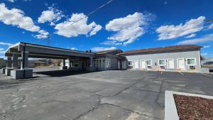 an empty parking lot in front of a building at Duchesne River LLC in Duchesne