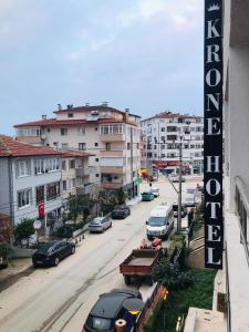 a view of a city street with cars and buildings at Grand Krone Hotel in Çınarcık