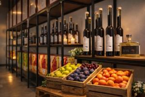 a display of bottles of wine and fruits on a shelf at Hofgut Stefan - BIO, Bodenständig, Bodensee in Uhldingen-Mühlhofen +10 photos