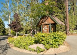 a sign for a park ranger center in a garden at Cozy Bear's Lair in Tahoe City