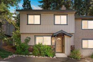 a house with a brown door at Cozy Bear's Lair in Tahoe City
