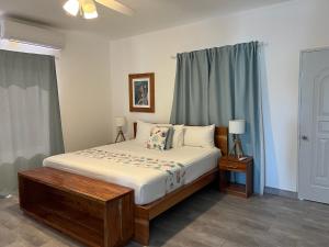 a bedroom with a large bed and a window at Apartamento Carey in Cabrera +53 photos