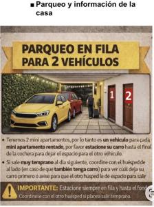 a poster for a car dealership with two cars at Alojamiento Cereza 2 in Alajuela