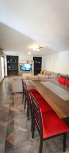 a living room with a large table and chairs at Casa Avellaneda I 12 pax - A 6 cuadras Arístides in Mendoza +35 photos