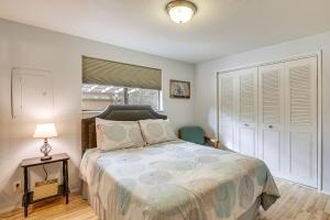 a bedroom with a bed and a window at Creative Escape! Eagle's Nest Hideaway in Cottage Grove