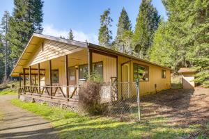 a yellow house with a lot of windows at Creative Escape! Eagle's Nest Hideaway in Cottage Grove