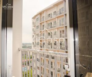 a view from the window of a building at MiCasa South Residences Cozy & Affordable Stay in Manila