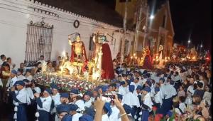 a group of people standing in front of a crowd at Casa Hotel Bijaos in Mompós