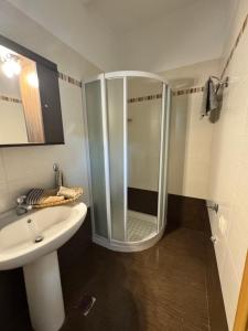 a bathroom with a shower and a sink at Hectora -Private Sunrise Retreat in Kerveli +33 photos