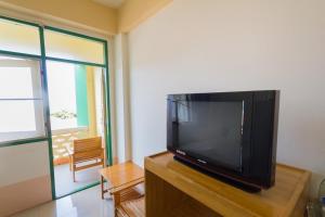 TV a/nebo společenská místnost v ubytování Mont Talay Hotel + 9 fotografií