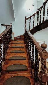 a set of stairs with pillows on them at Vila Rapsodia Sinaia in Sinaia +43 photos