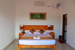 Postel nebo postele na pokoji v ubytování Chillhouse Lembongan