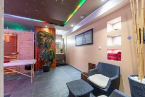 a waiting room with a rainbow on the ceiling at Apartments and rooms with a swimming pool Sukosan, Zadar - 5906 in Sukošan