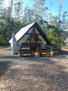 a gazebo with a white tarp on it at Sombra do baú -Luar in Timbe do Sul