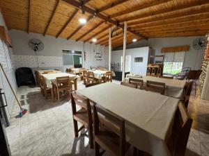 a large dining room with tables and chairs at Quinta La Soñada eventos luján in Luján +8 photos