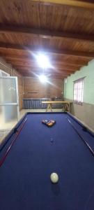 a pool hall with a pool table in a room at Quinta La Soñada eventos luján in Luján