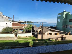 a view from the roof of a house at Recanto na Praia com Vista Mar in Mangaratiba