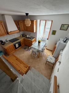 an overhead view of a kitchen with a table at CA'da LU' in Velva