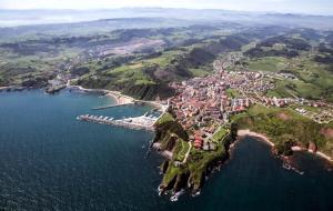 an aerial view of a small island in the water at Bermejo Apartamento in Candás