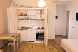 Kuchyňa alebo kuchynka v ubytovaní Amalia Bakery Home + 23 fotografií