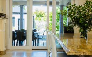 a dining room with a table and a dining room at ABC Beachside Retreat in Rosebud