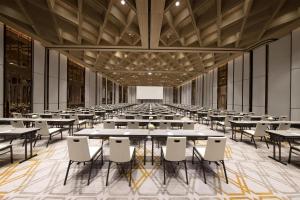 an image of a banquet hall with tables and chairs at Hyatt Regency Bangkok Sukhumvit in Bangkok