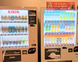 a vending machine filled with different types of drinks at Hotel Route-Inn Shimodate in Chikusei