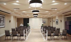 a room with a bunch of chairs in it at Hilton Madison Monona Terrace in Madison +38 photos