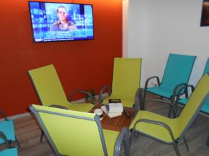 TV a/nebo společenská místnost v ubytování Camping Saint James