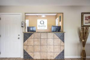 a view of a waiting room with two laptops on a counter at Quality Inn White Springs Suwanee in Live Oak