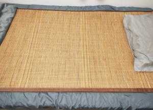 a close up of a mattress on a bed at EnDanni Hostel in Amphoe Thalang
