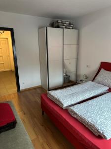 a bedroom with a bed and a glass cabinet at alisa in Srebrenik