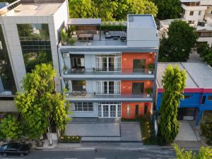 an aerial view of a house with trees at Travinities Premier, Ujjain in Ujjain