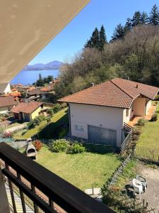 a view of a house from a balcony at Appartamento il Punto Alto in Baveno