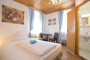 Postel nebo postele na pokoji v ubytování Hotel Moosbichl + 29 fotografií