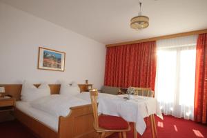 Rúm í herbergi á Haus Geiger