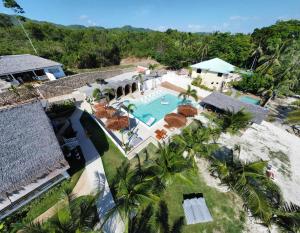 an aerial view of a resort with a swimming pool at SIQUIJOR - THE SEANDYOU Resort in San Juan