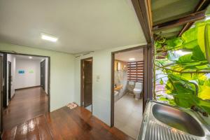 a bathroom with a sink and a toilet in a room at WUA LAI Boutique Hotel Chiang Mai in Chiang Mai +107 photos