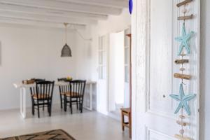 a room with a door with stars on it at Casa Calypso in Tselendáta +26 photos