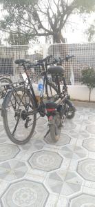 a bike is parked on a tile floor at Kì thanh hotel in Thanh Hóa +18 photos