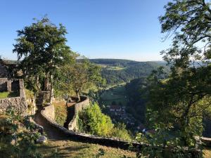 a view of a river from a hill at Speidel´s BrauManufaktur in Ödenwaldstetten