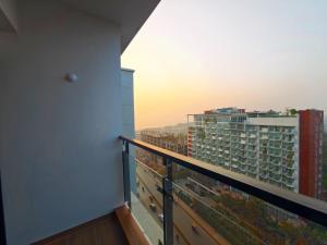 a balcony with a view of a city at Hotel Grand Pacific in Cox's Bazar
