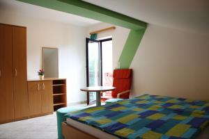 En eller flere senge i et værelse på Apartment Kolman