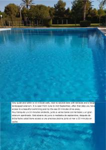 a large swimming pool with blue water at Luxe Vista in Serra