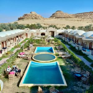 an aerial view of a resort with a swimming pool at King Siwa in Siwa