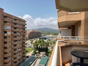 a view from the balcony of a apartment building at Magic World Vistamar lll in El Borseral