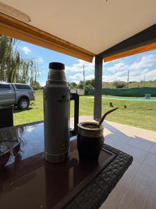 a water bottle sitting on top of a table at Potrero Village Suites Refugios Serranos in Potrero de Garay
